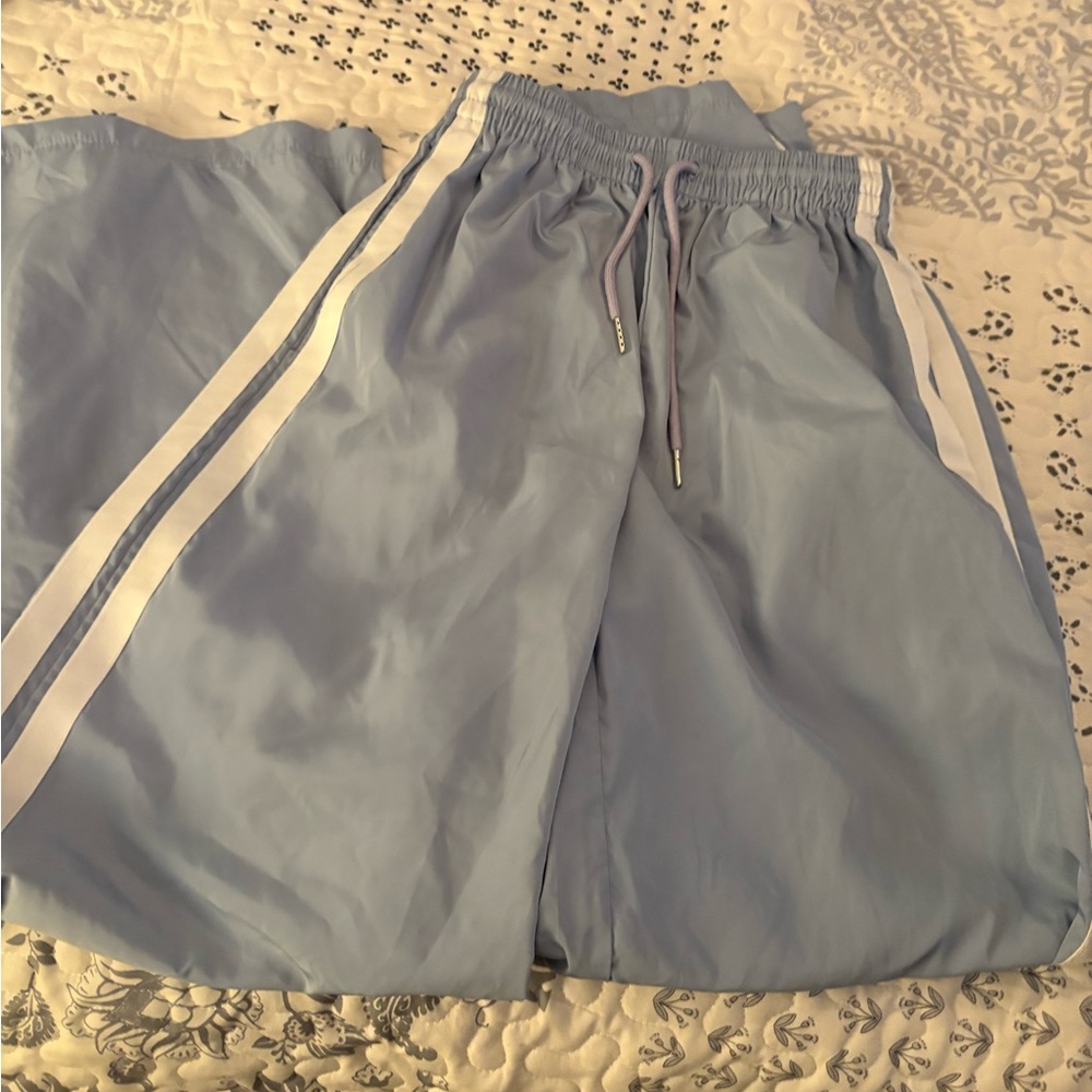 Edikted Light Blue Track Pants with White Side Stripes